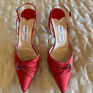 Jimmy Choo, red satin heels with pavé buckle and pave  a fastener
